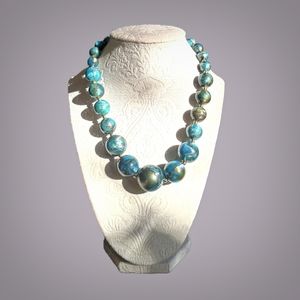 Modern blue swirls graduated beads necklace